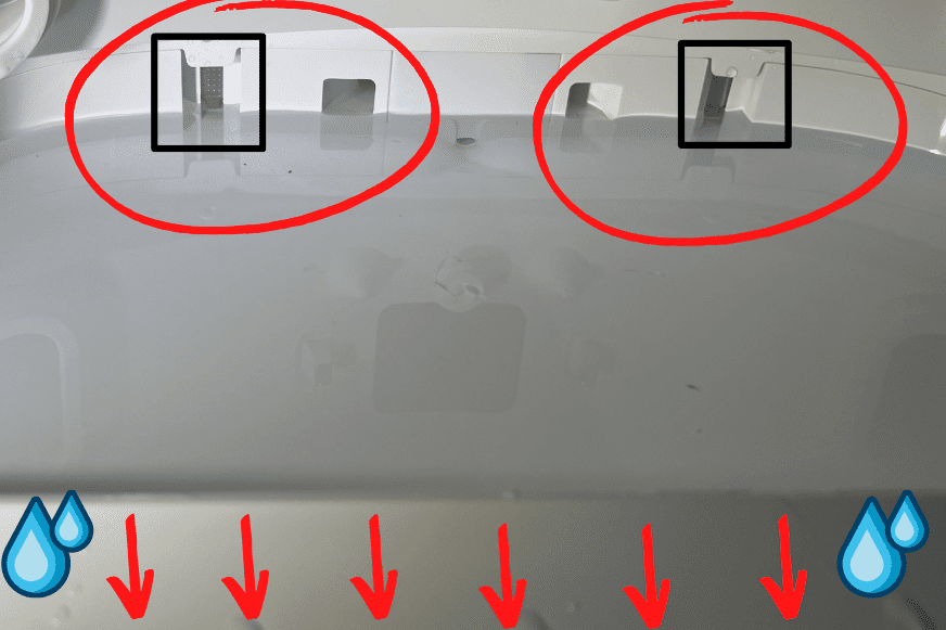 The electrical contacts that measure water level in the base station are circled in red.